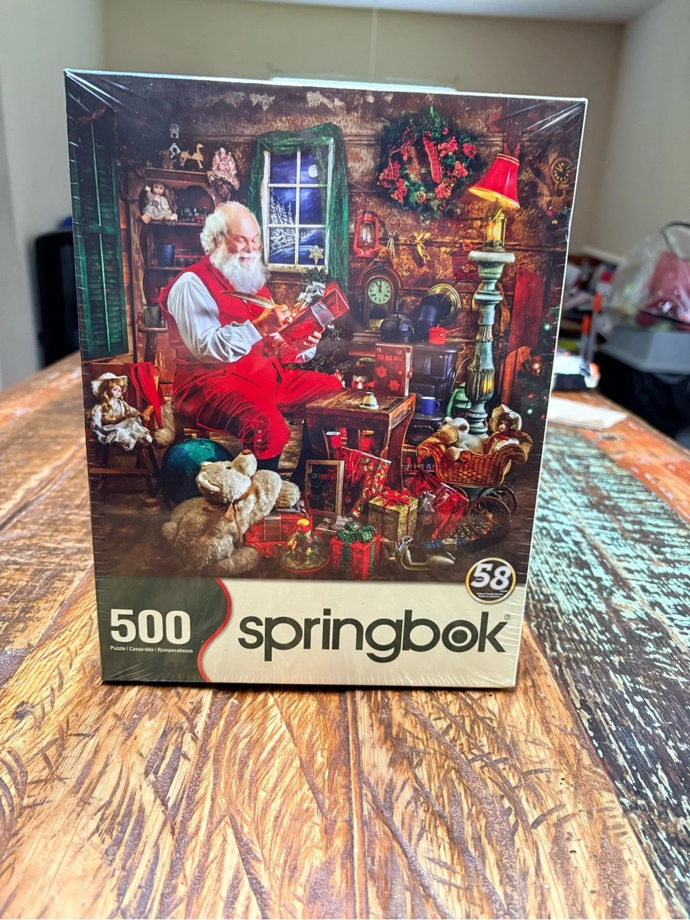Springbok 500-Piece Santa’s Workshop Jigsaw Puzzle Green & Reds 18”X23.5”